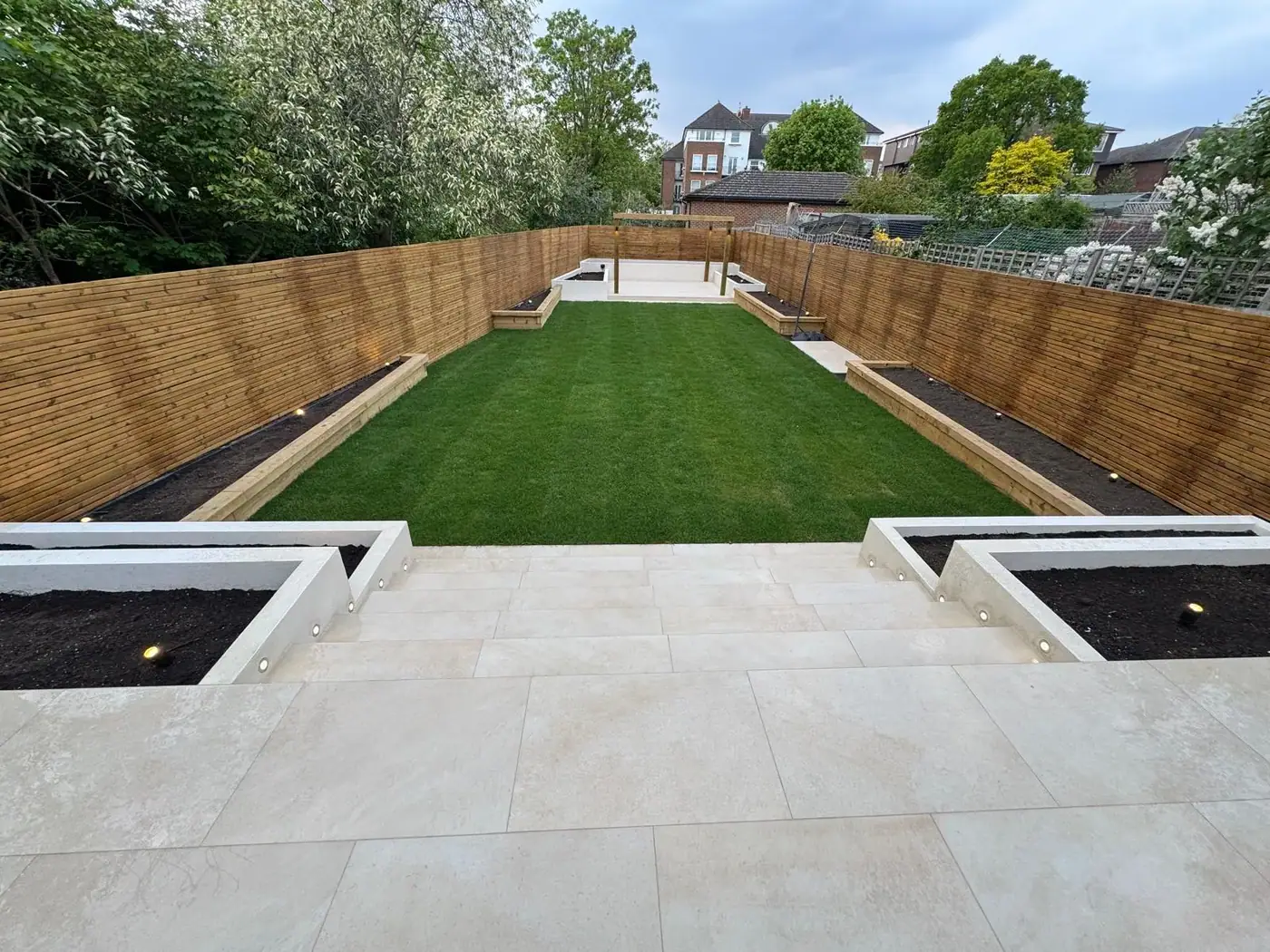 Porcelain garden terrace, lawn & pergola; photograph 4