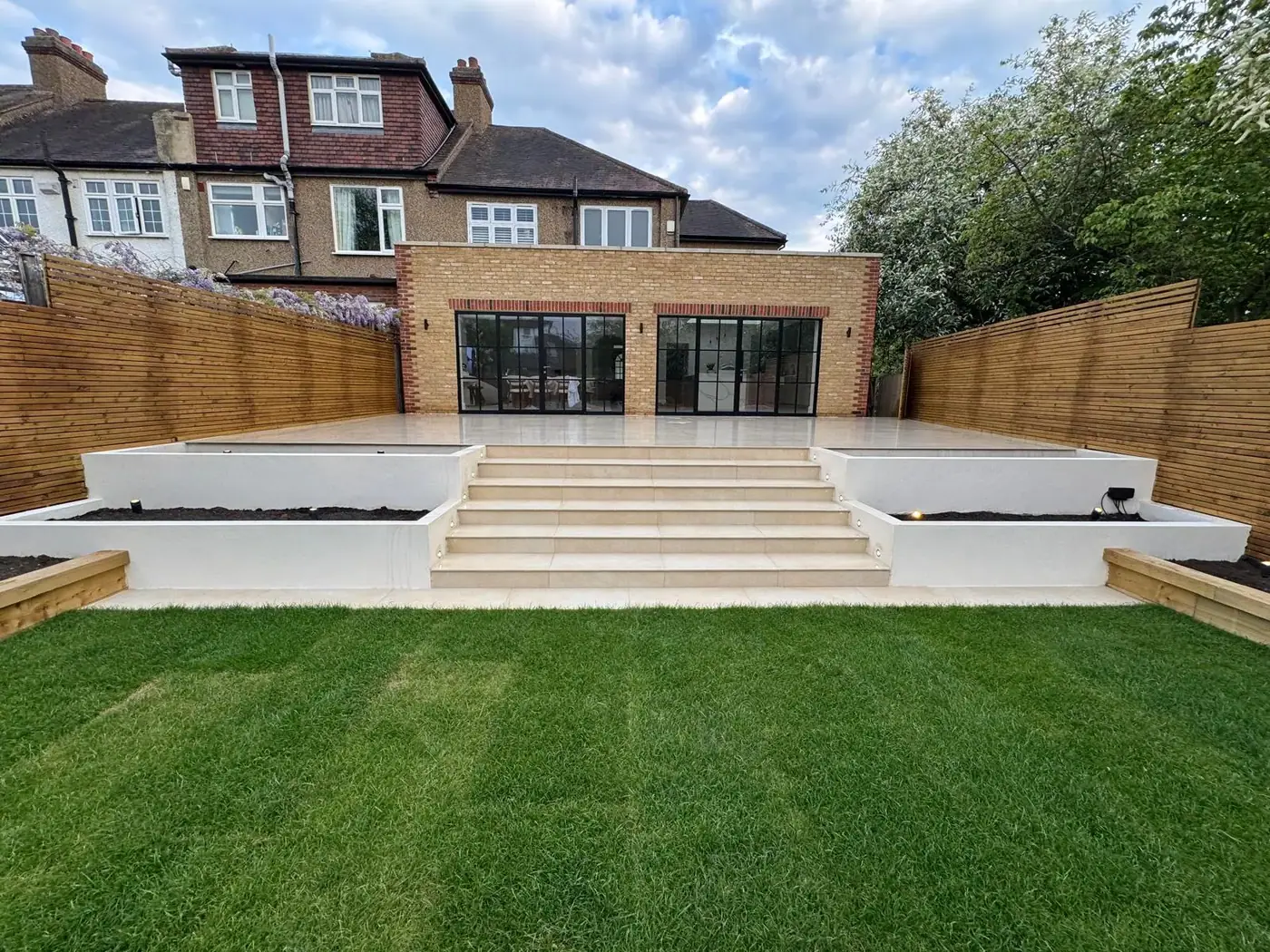 Porcelain garden terrace, lawn & pergola; photograph 10