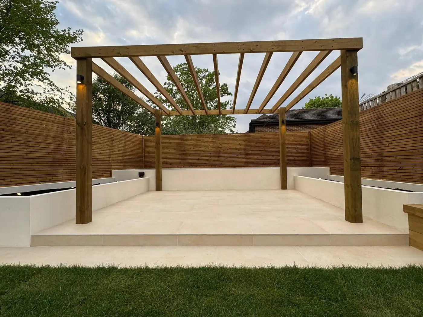 Porcelain garden terrace, lawn & pergola; photograph 11