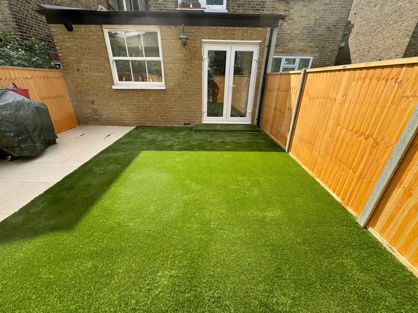 New lawn, paving & timber fencing: VISAN-supplied photograph