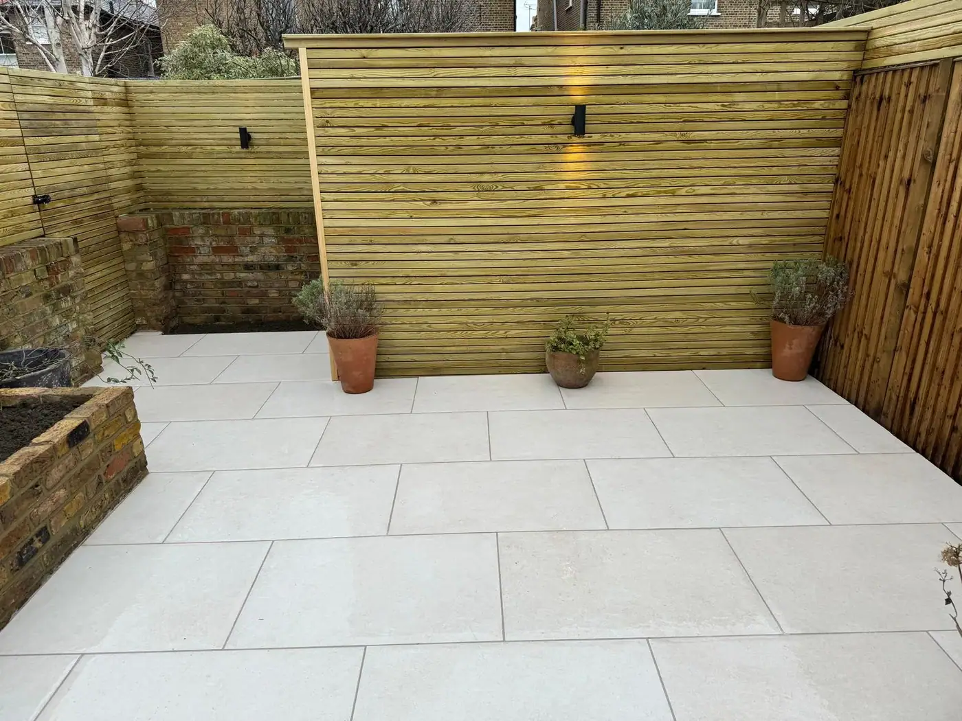 Porcelain patio & raised brick planters; photograph 46