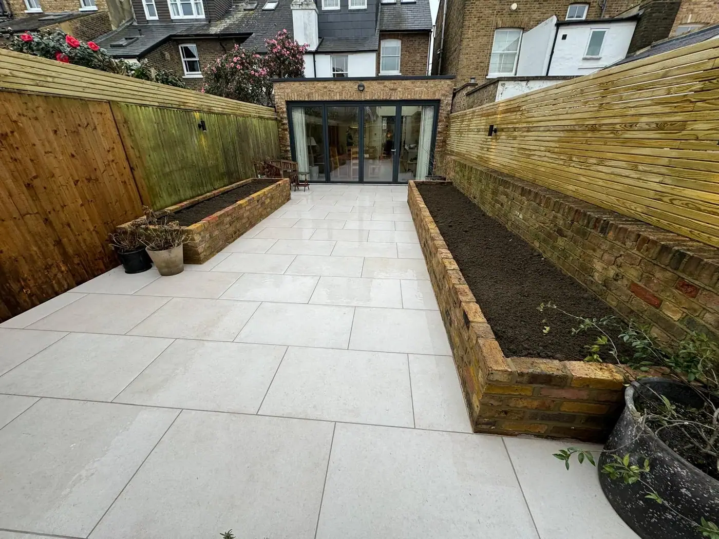 Porcelain patio & raised brick planters; photograph 47