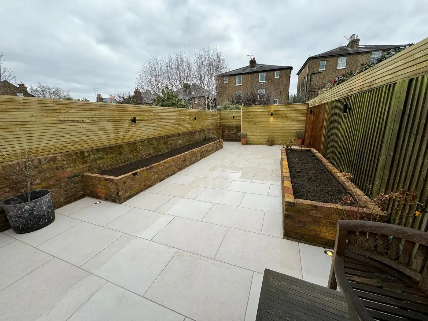 Porcelain patio & raised brick planters; photograph 48