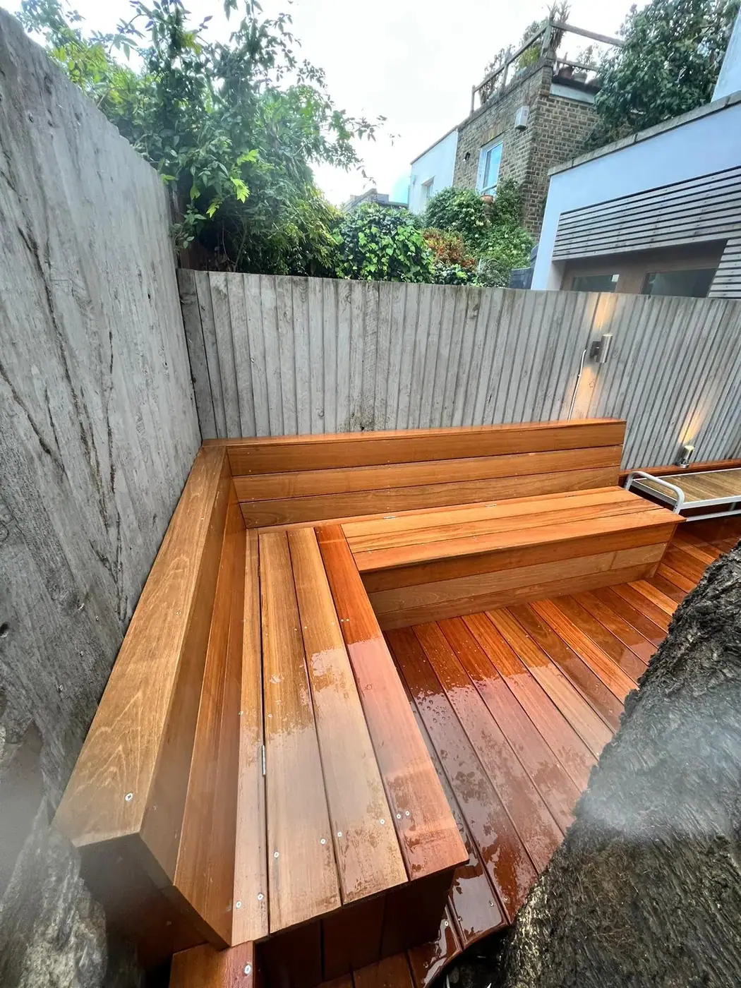 Built-in hardwood seating & decking; photograph 51